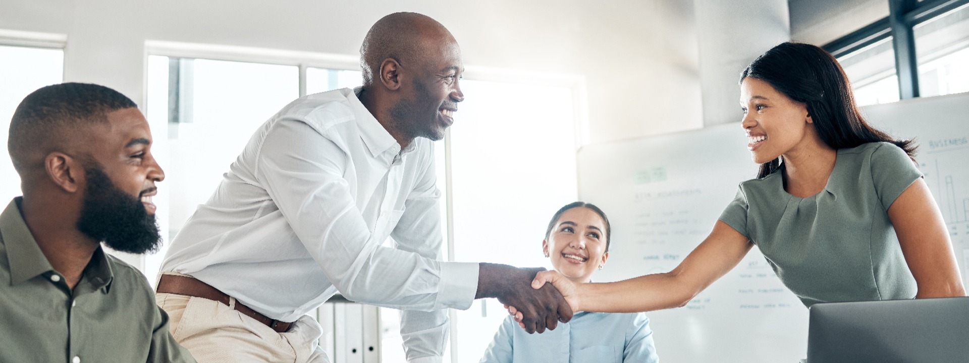 Two business people shake hands after a negotiation.
